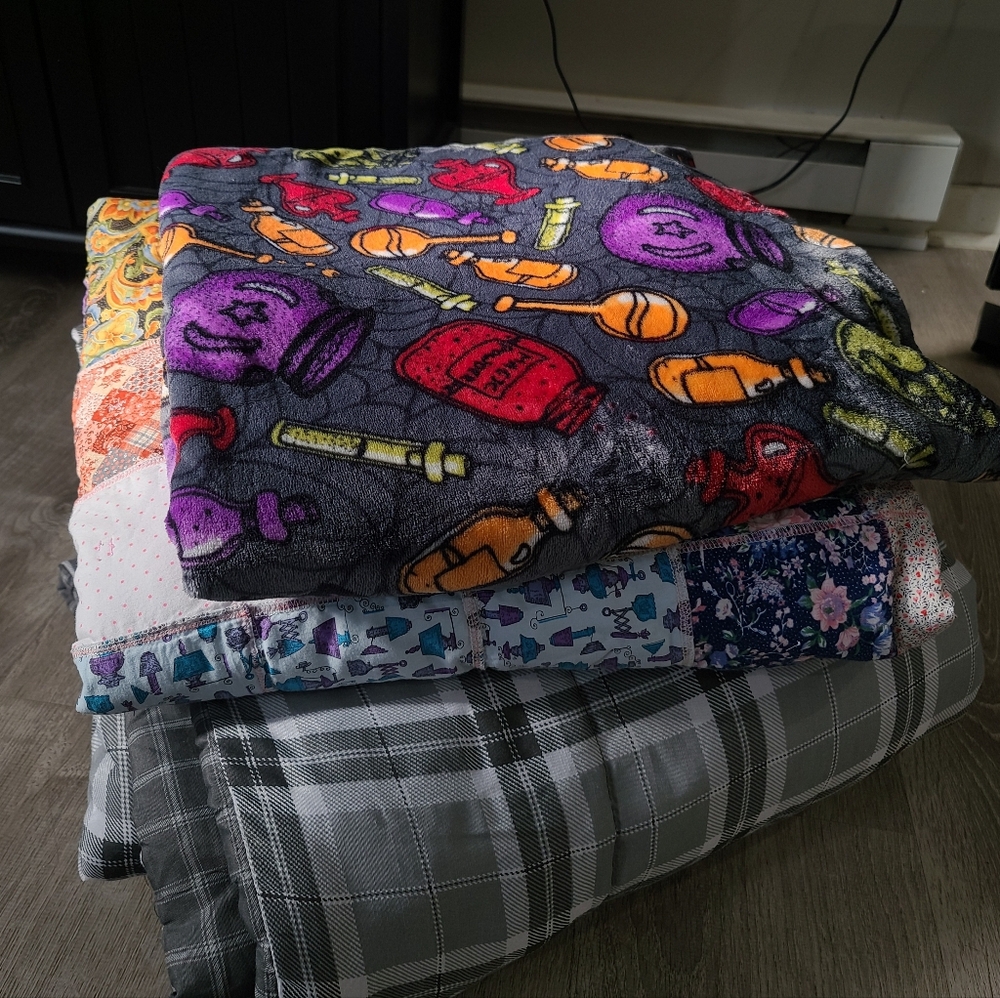 Colorful Patterned Blankets and Quilt